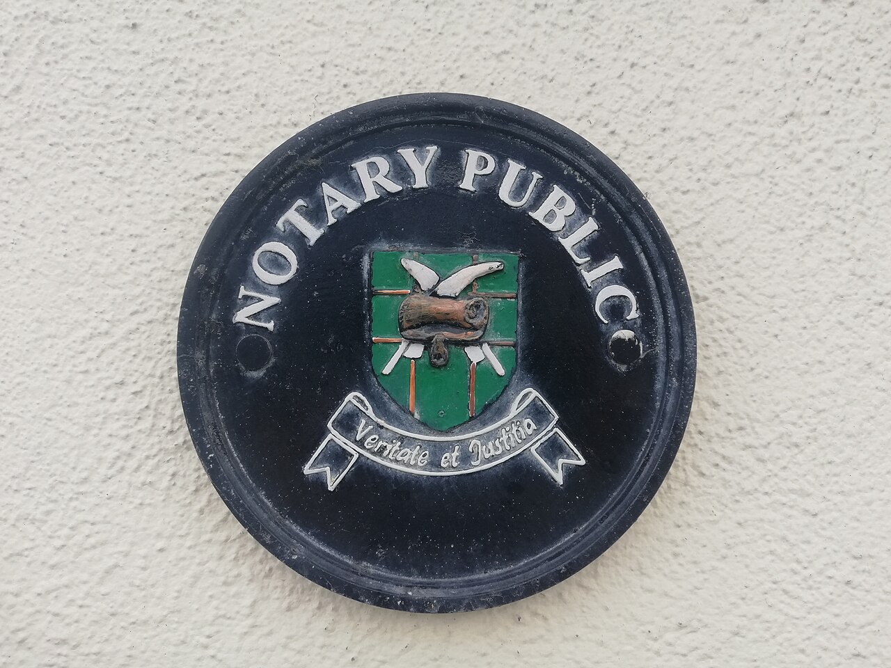 A notary public plaque outside an office